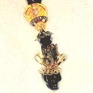 Skull head goth key chain bling or window sun catcher.